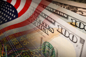 American flag with dollars and the stock market