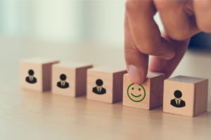 changing blocks with people and a happy face