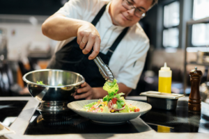 a cook doing a salad