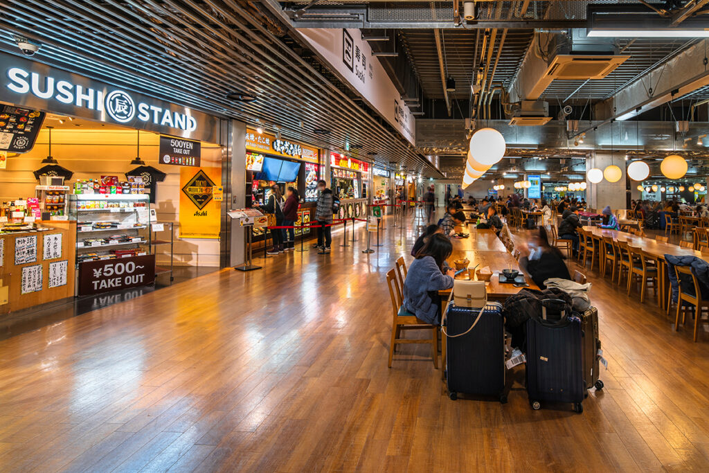 Passengers enjoy global cuisine at Narita International Airport.