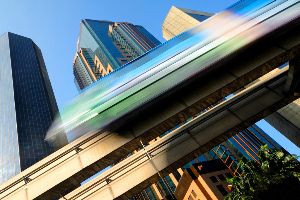 Speeding train in Tokyo, symbolizing the city’s efficient transportation network, key for second-home investment appeal
