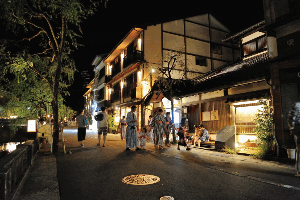 Toyooka City's theater festival holds  street performances at Kinosaki Onsen by the festival market food trucks