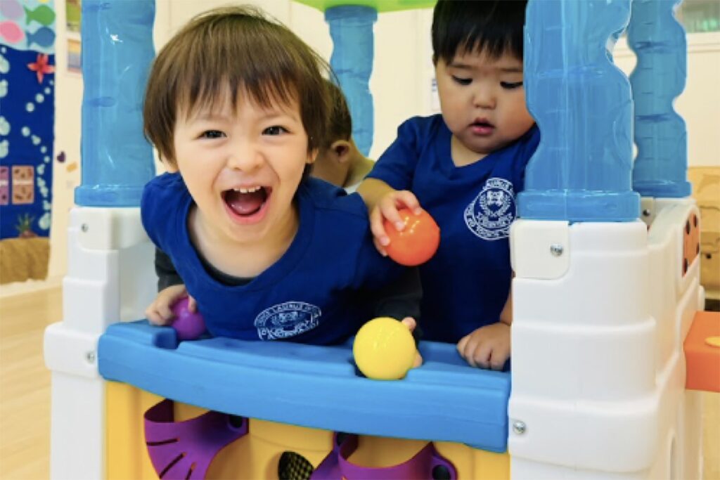 Two preschool children in Tokyo learning through playful STEM activities.