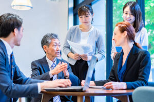 Japanese and global having a meeting in an office