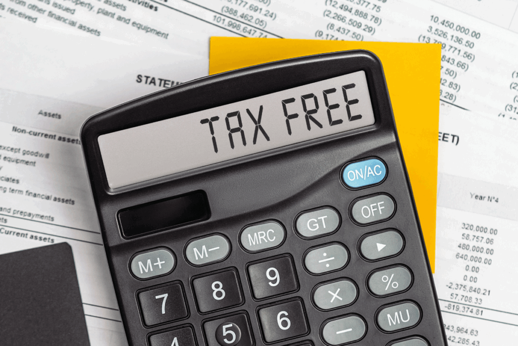 Calculator with the words tax free and other scattered documents