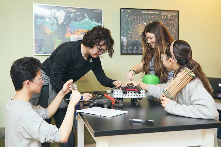 Students collaborating in a hands-on learning environment that reflects KAIS’s research-based, student-centered teaching approach.