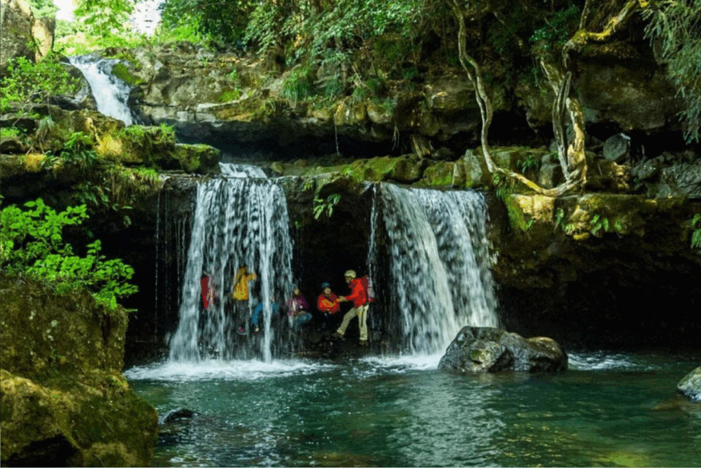 Scenes from Kinosaki Onsen in autumn showcasing its hot springs, cultural workshops, outdoor adventures, and tranquil scenery.