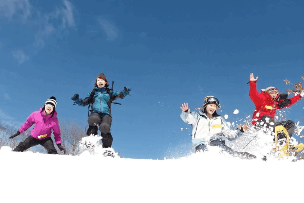 Visitors enjoying winter activities and seasonal experiences in Kinosaki Onsen and the Kannabe Highlands.