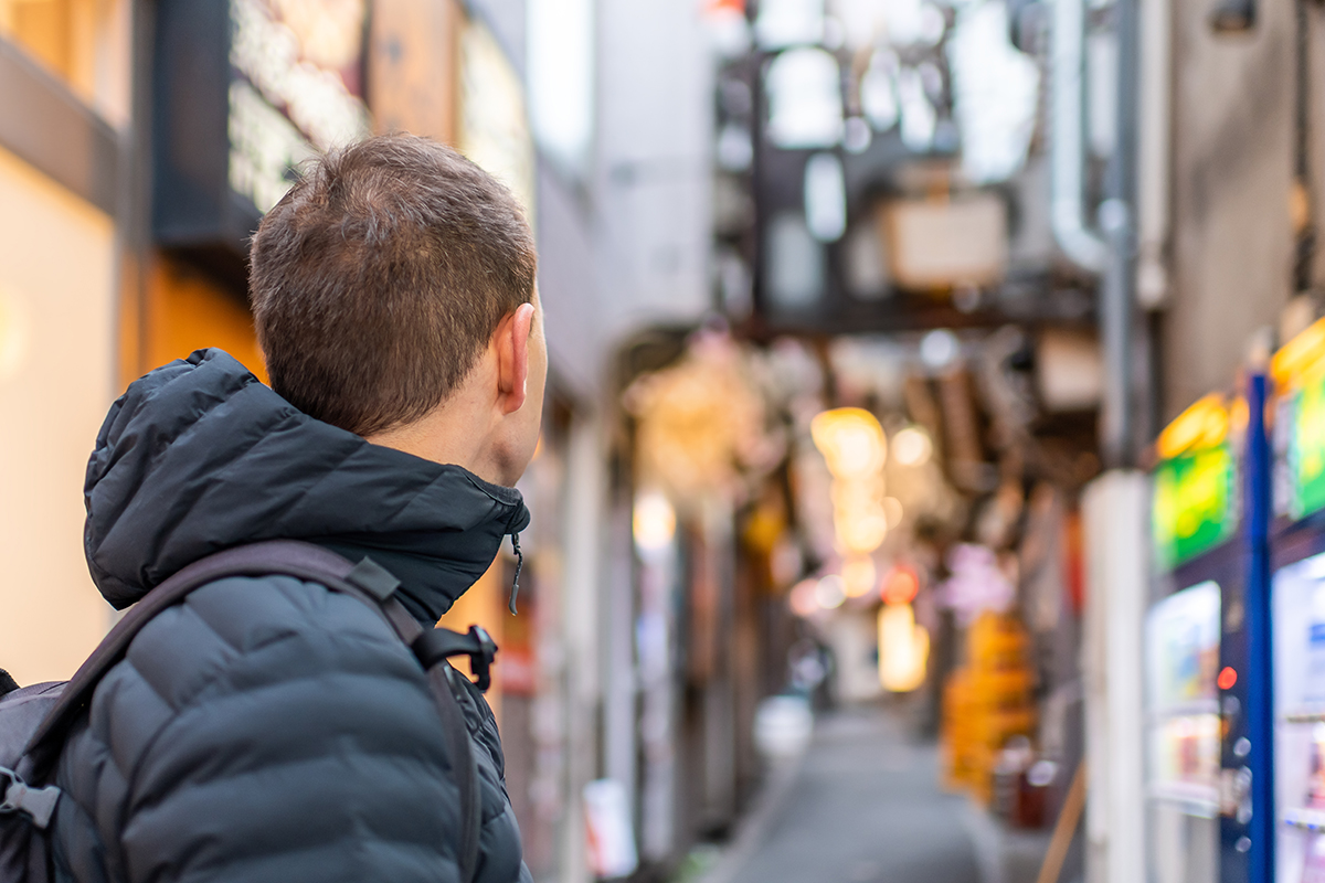 Tokyo Japan backpacker exploring cool streets