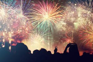 Cheering crowd and fireworks - New Years Celebration
