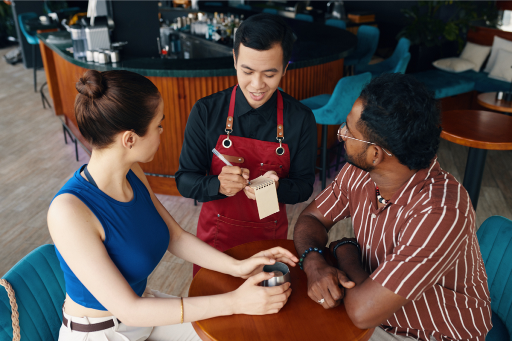 A cozy Japanese café street scene representing the idea of a community third place.

