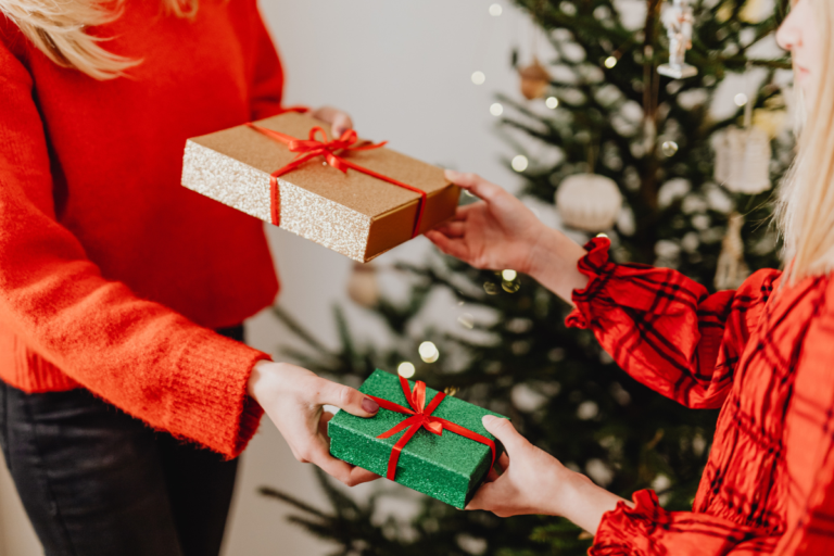 Giving Christmas presents.