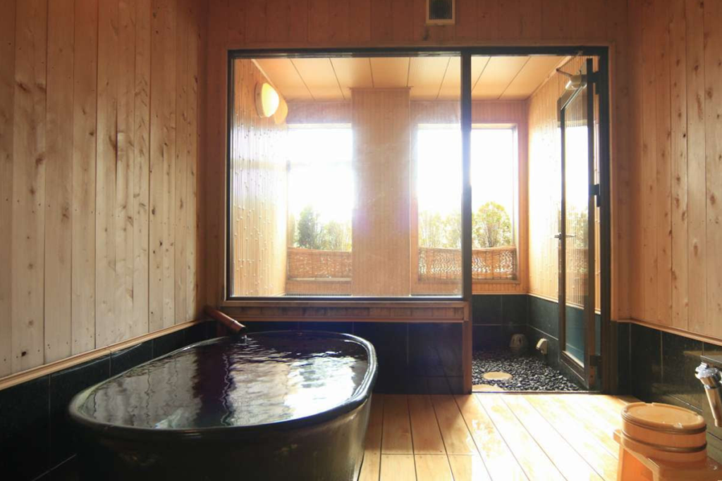 Private indoor-outdoor hot spring bath in Kinosaki Onsen.