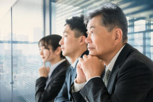 Japanese business people of various ages and genders