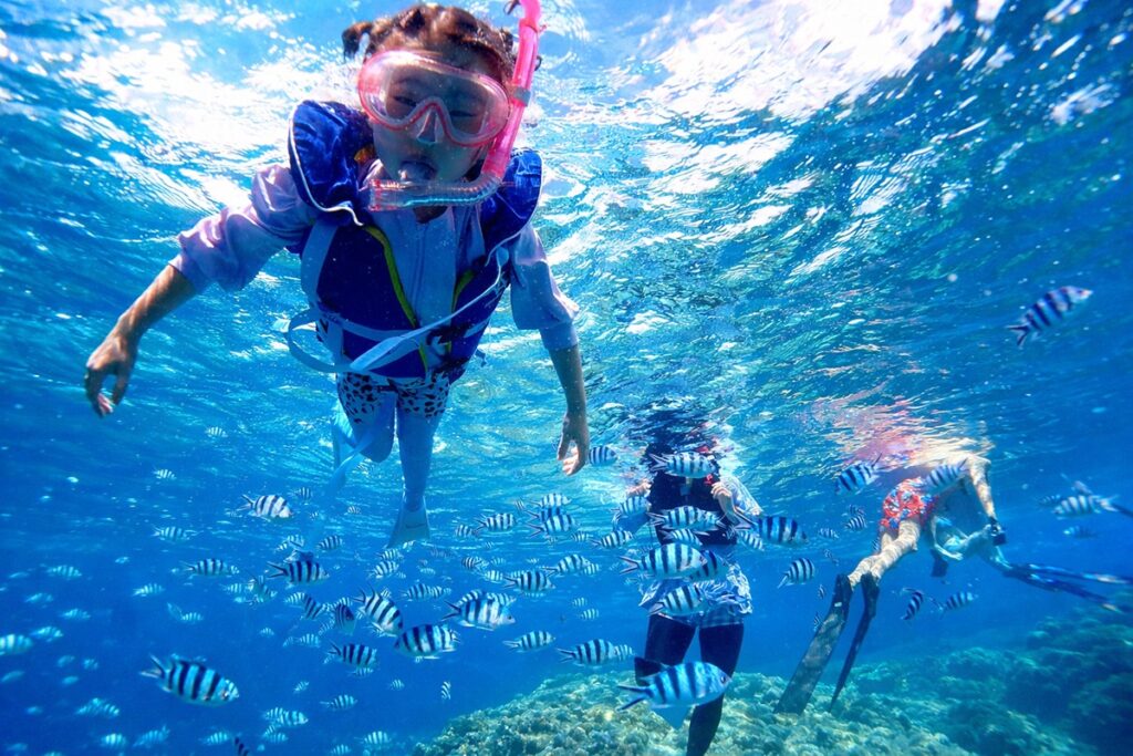 a child doing snorkeling