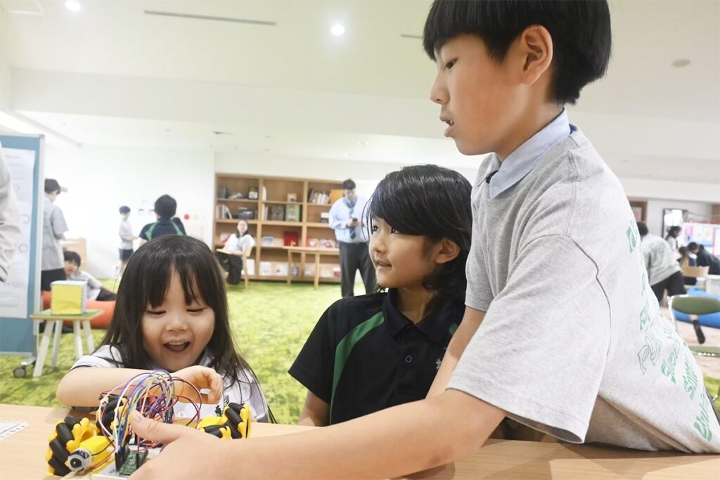 Students interacting and engaging in a science and engineering project