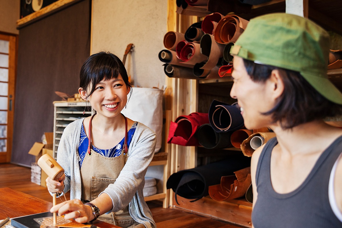 Woman making traditional Japanese crafts in Tokyo