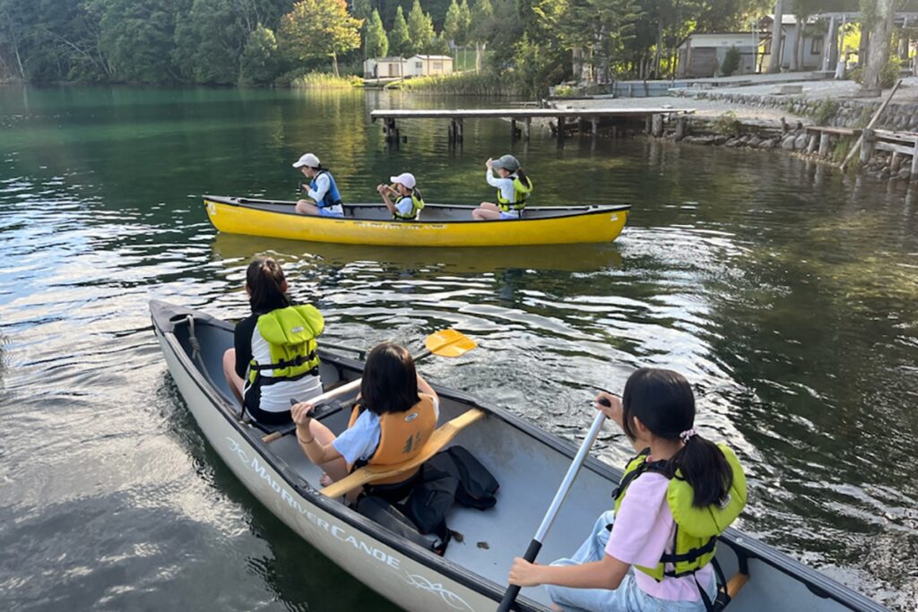 Malvern College Tokyo students outdoors in a canoe