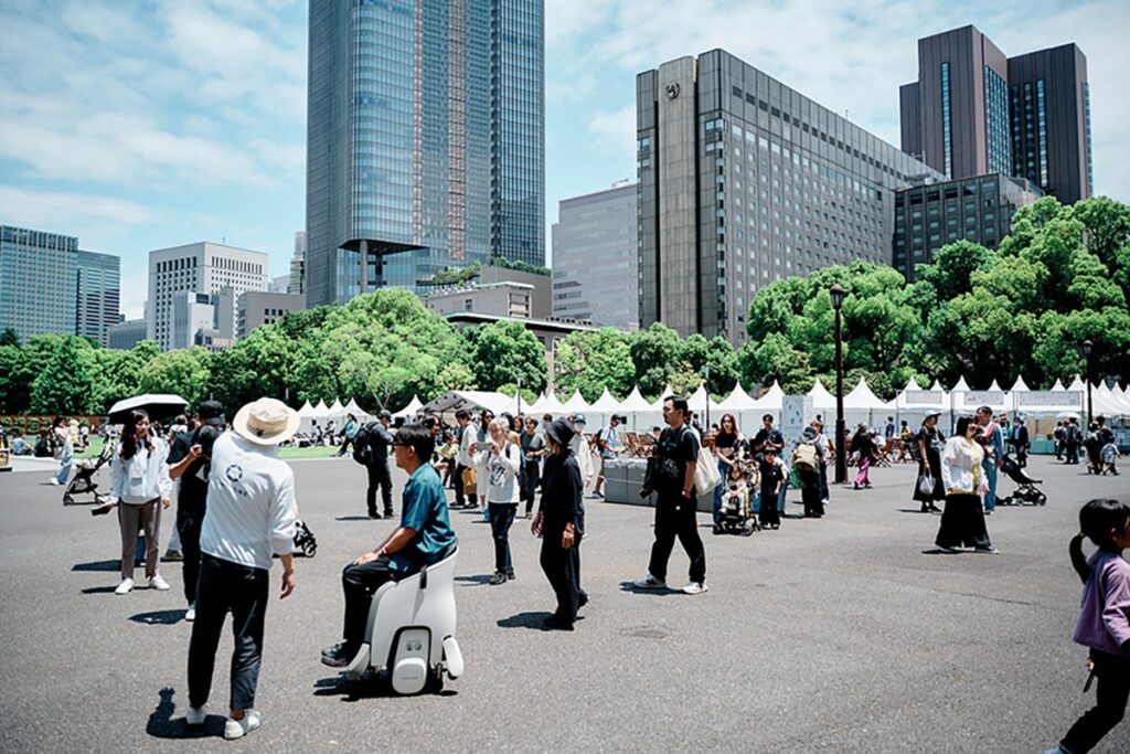 Crowds enjoy the Hibiya Music Festival activities in Hibiya Park, Tokyo