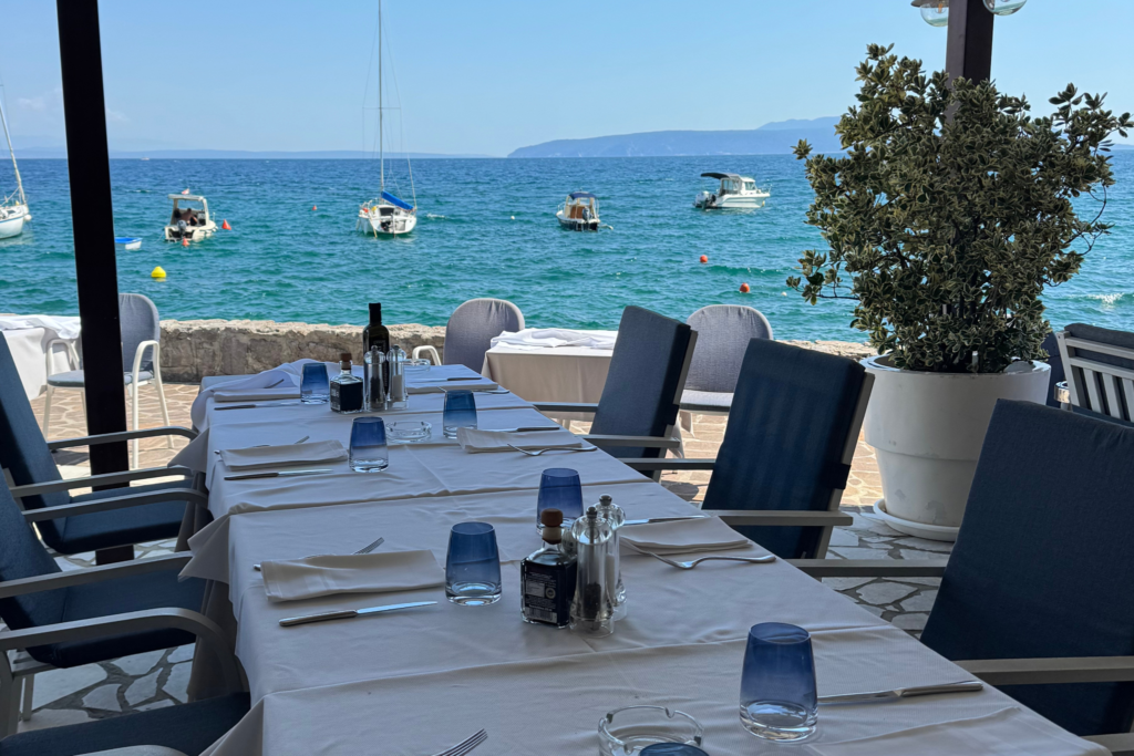 A restaurant table with an ocean view in Croatia