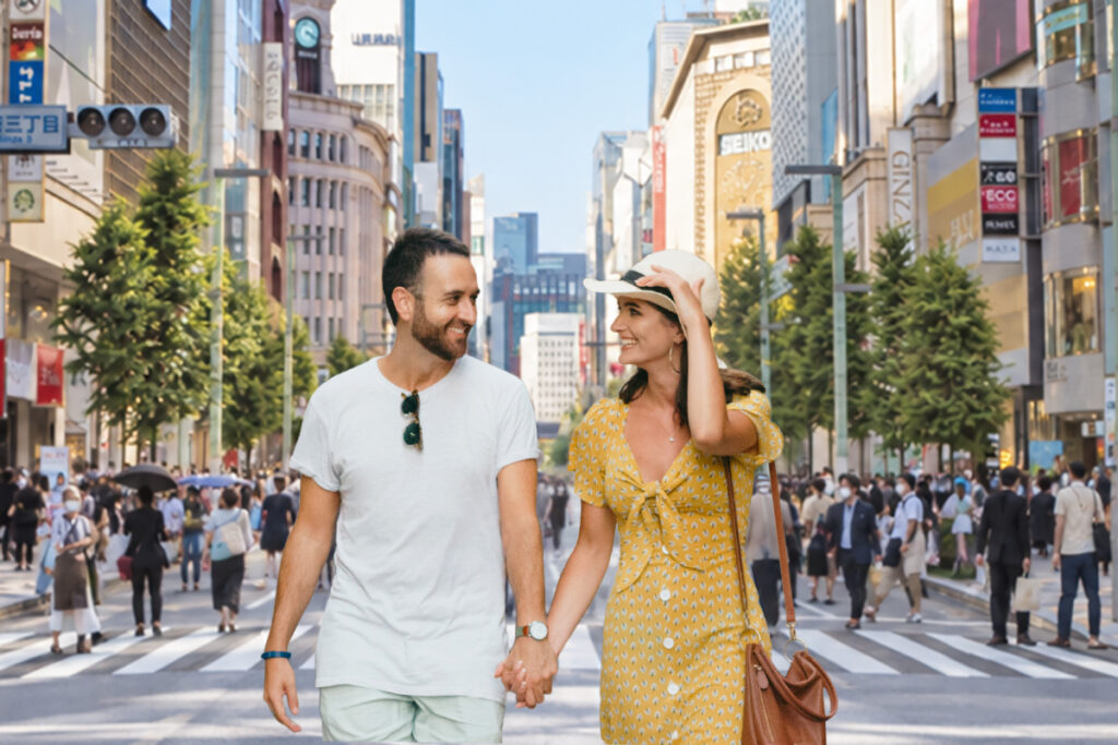 Global couple walking through Ginza, Tokyo